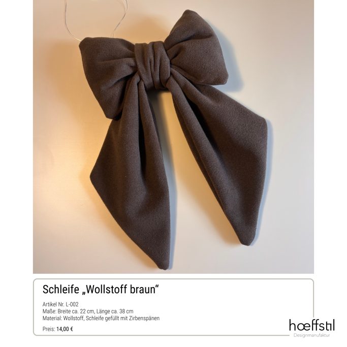 Braune Wollstoffschleife mit zwei langen Enden, elegant gebunden.