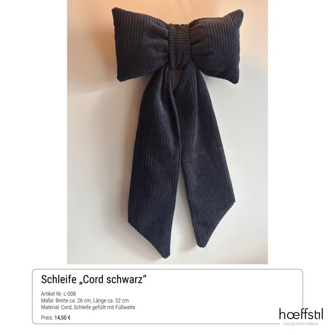 Schwarze Schleife aus Cord mit breiten Enden. Ideal für stilvolle Akzente.